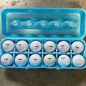Lot of 12 Nitro golf balls.